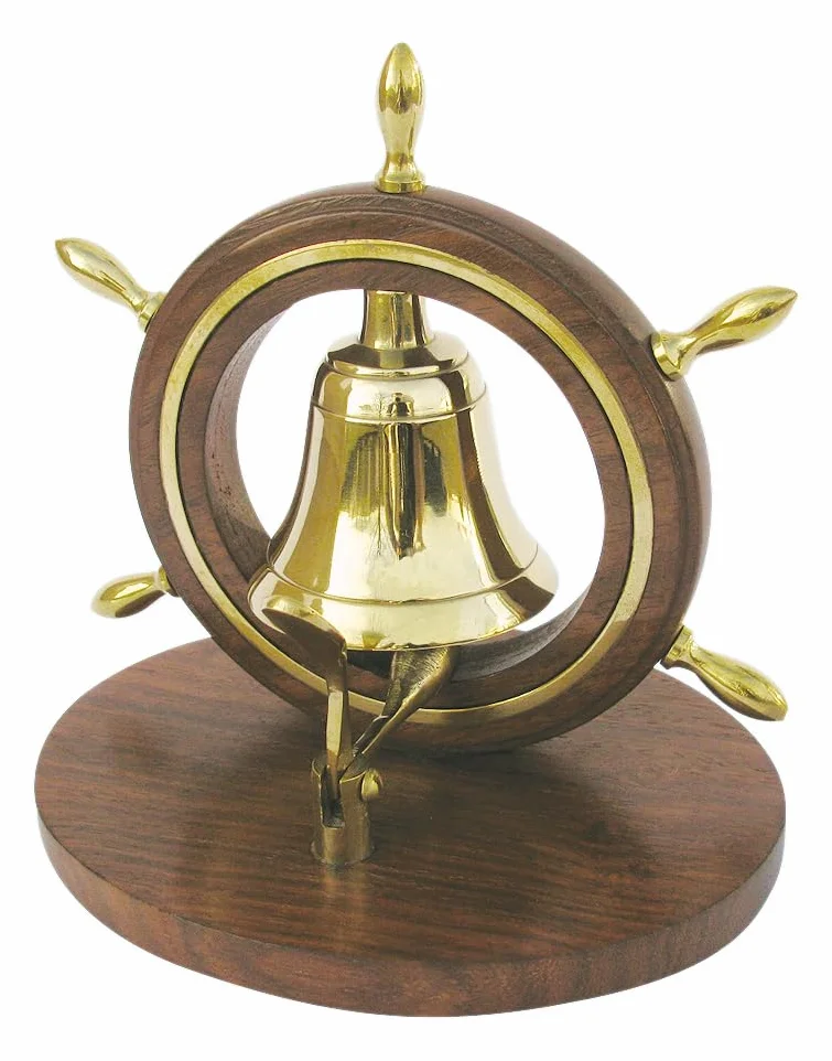 Campana de mesa en timón de latón y madera, perfecta para la decoración marítima.