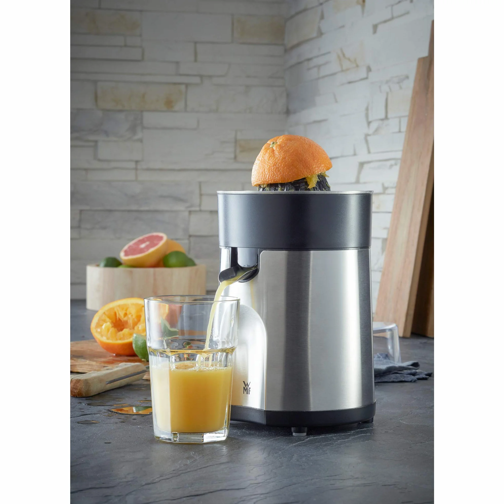 WMF Stelio - Exprimidor, 85 W, 2 conos intercambiables y colador extraíble de cromargan y cierre antigoteo, apto para limón, naranja y pomelo, acero inoxidable, cromargan