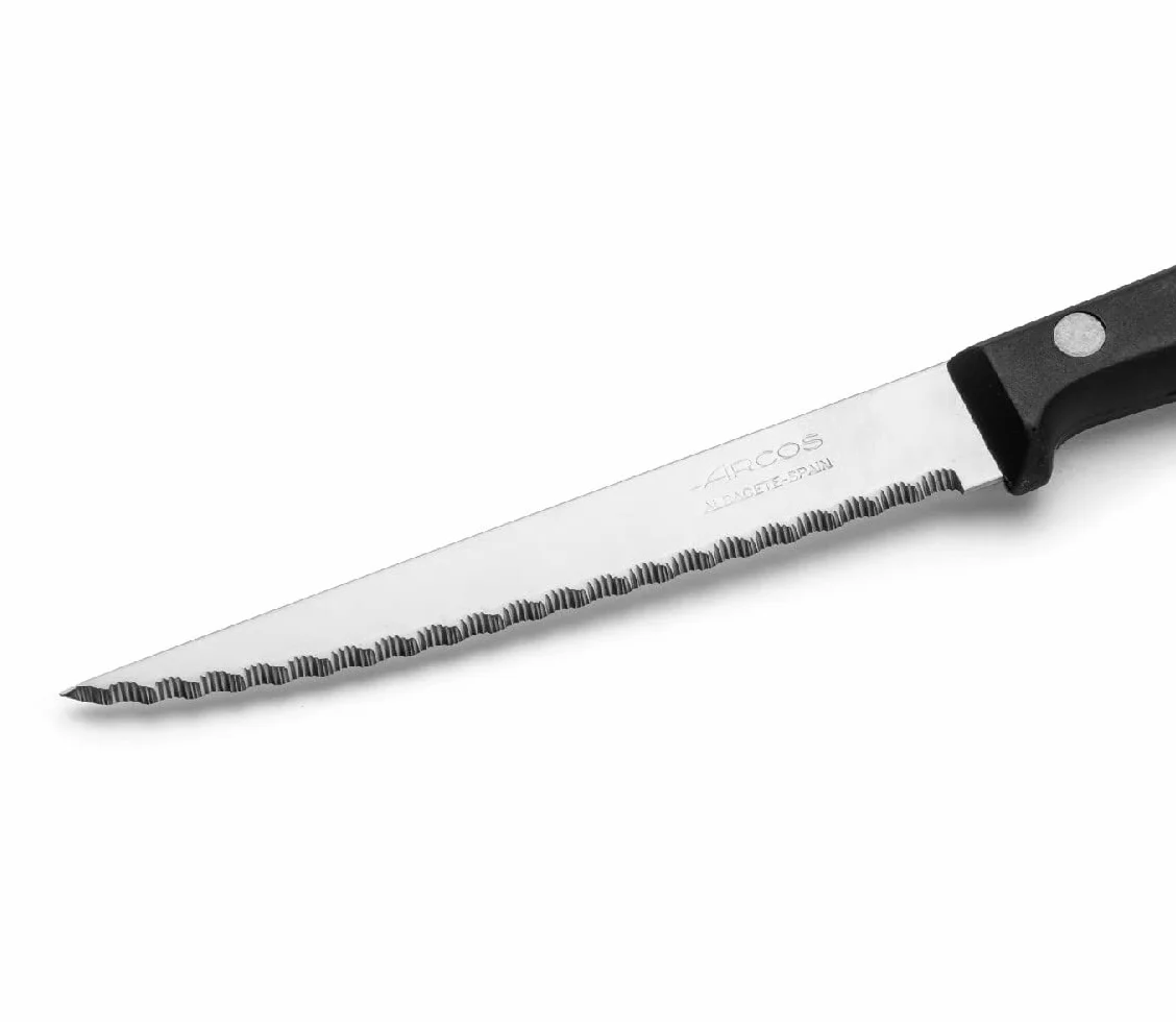 Arcos Cuchillos de Mesa - Caja de 12 uds Cuchillo Chuletero Cuchillo de Mesa - Hoja de Acero Inoxidable NITRUM 110 mm - Mango de Nylon - Color Negro (12 uds)