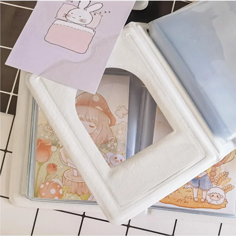 SURALIN 1 mini álbum de fotos con 40 bolsillos, soporte para tarjetas de fotos Kpop, soporte para tarjetas de fotos con corazón de amor hueco, carpeta Kpop, soporte para tarjetas de fotos (azul claro)