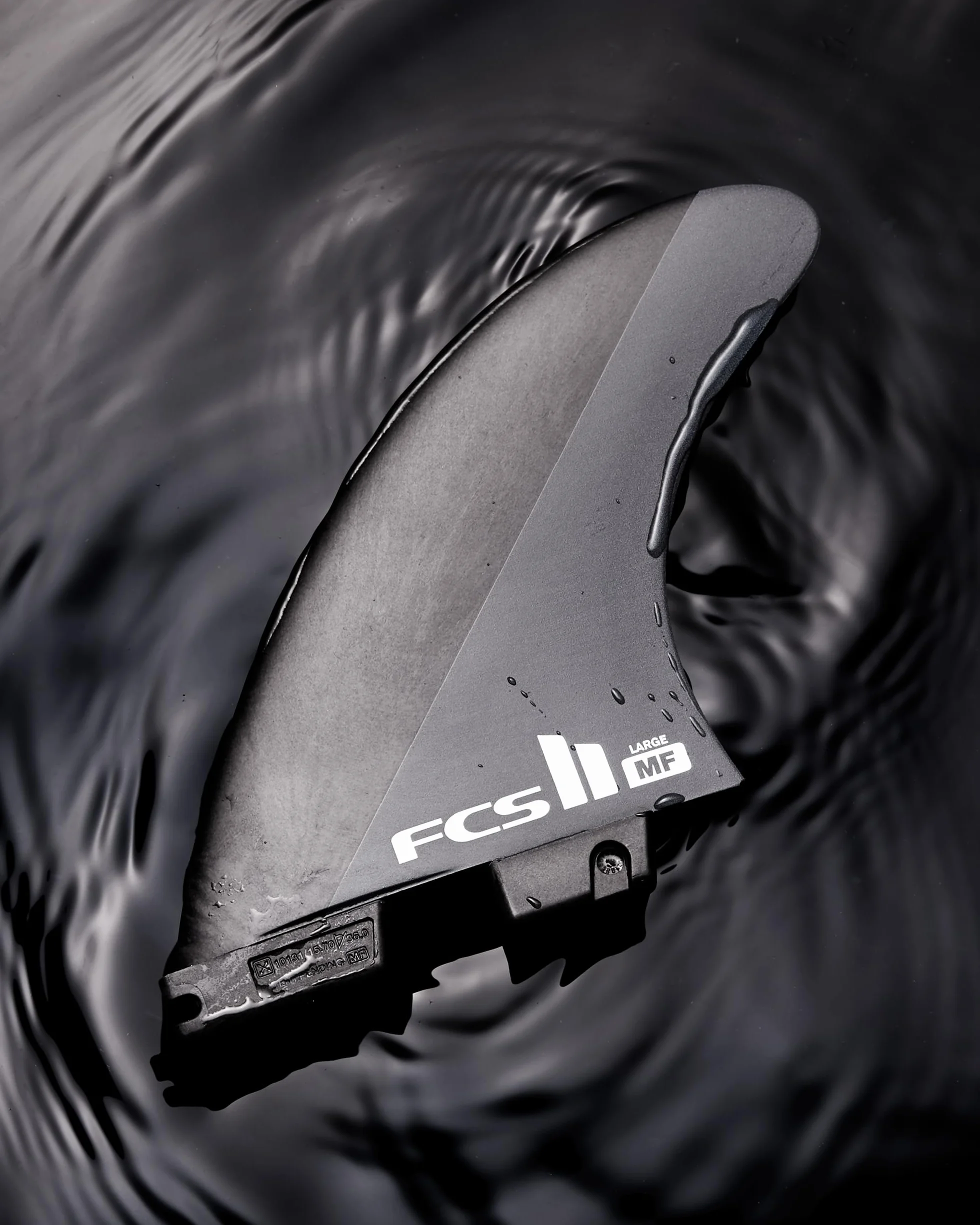 FCS II Mick Fanning Neo Carbon Tri Finnen Set 2024 Black/Charcoal