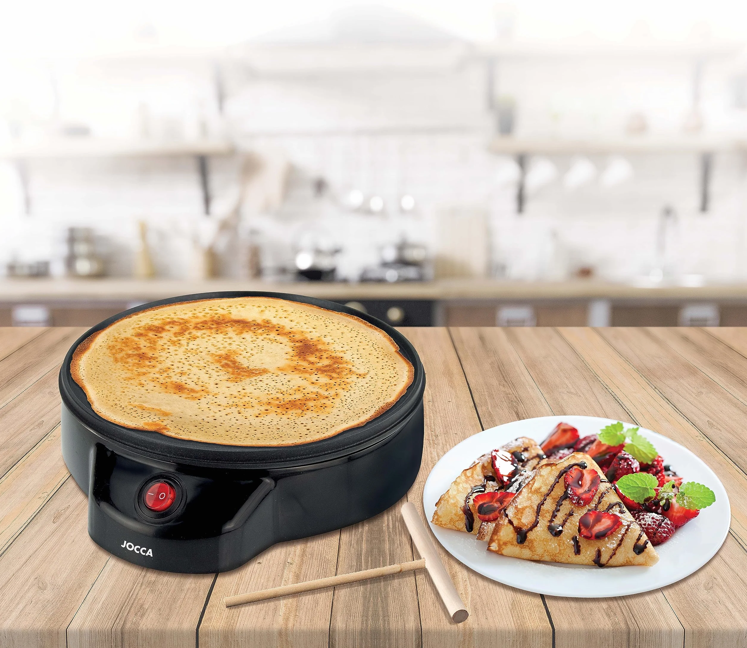 JOCCA - Máquina Crepera Eléctrica con Placa de 22 cm de Diámetro| Potencia 700W| Revestimiento Antiadherente| Incluye Esparcidor de Madera| Boton on-off| Indicador Luminoso| Ideal para fiestas| Negro