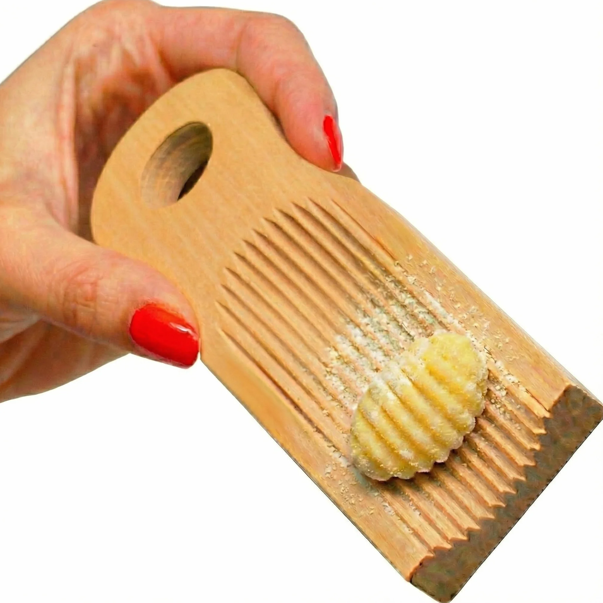 Auténtica tabla de ñoquis para hacer pasta de ñoquis italiana a mano.