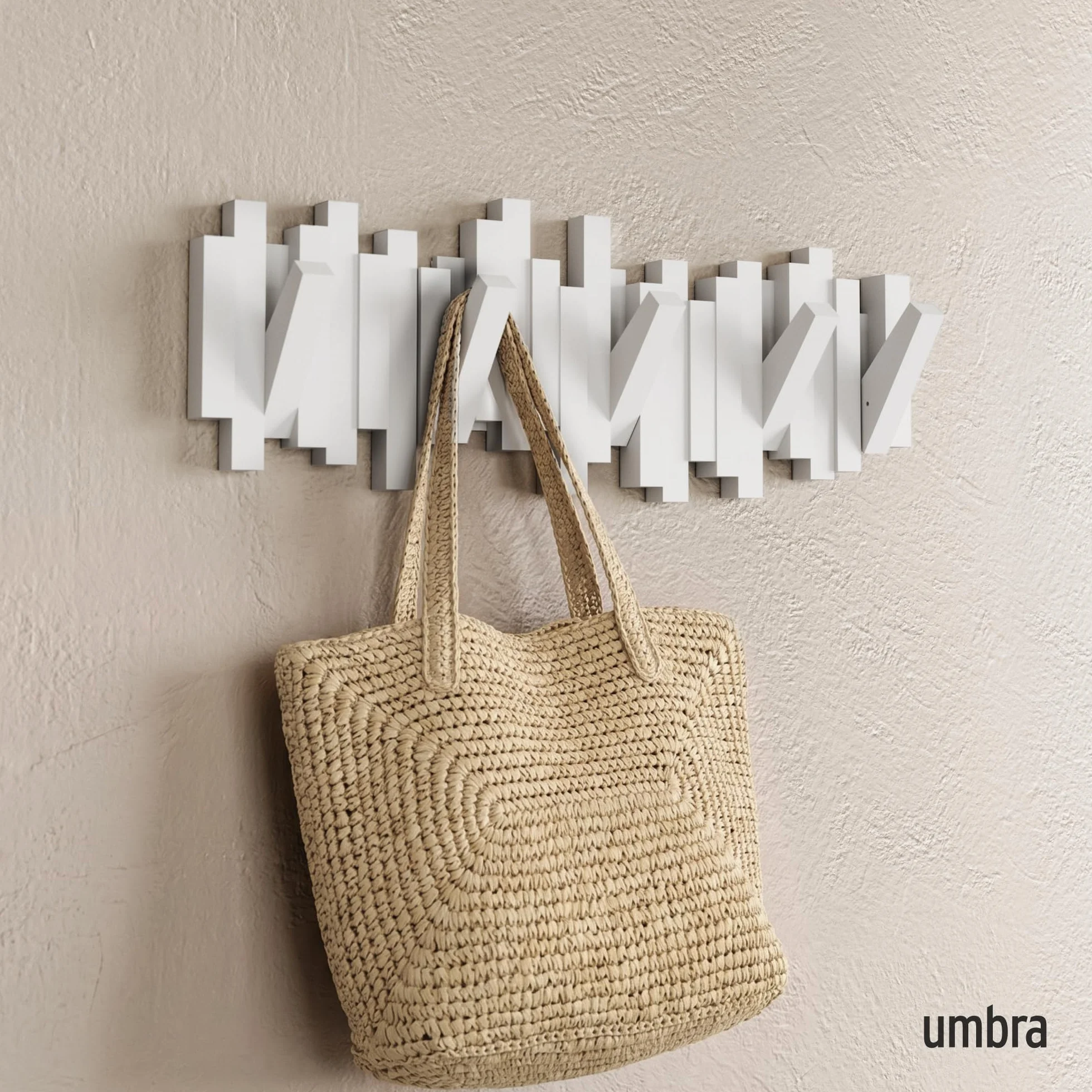 Umbra Sticks perchero de pared con gancho de riel y 5 clavijas retráctiles – Organizador de almacenamiento moderno que ahorra espacio, blanco