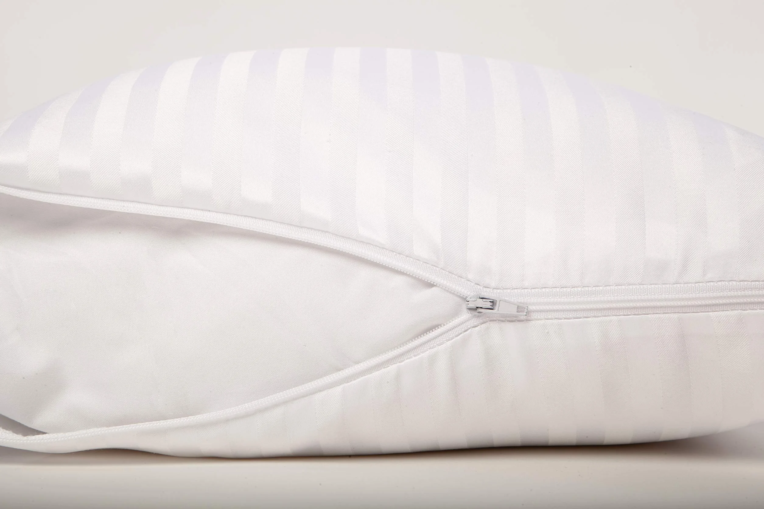 Seasons - Almohada Infantil de Fibra, 80 cm, Extrasuave, Antiácaros, Almohada Baja Firmeza, con Doble Funda con Cremallera, Funda Exterior Satén Algodón, Fabricado en España